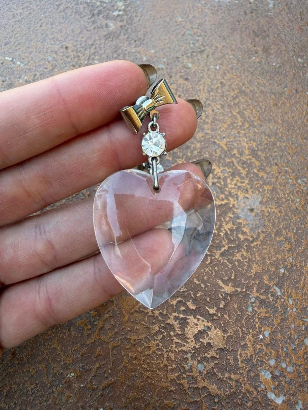 Vtg Clear acrylic diamond like heart earrings with bow and rhinestone detail